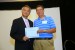 Dr. Hsing-Wei Chu, Program Committee Chair, giving Dr. Terrence P. Fries the best paper award certificate of the session "Information and Computing Technologies (CITSA) / (WMSCI)". The title of the awarded paper is "Conflict Resolution and Concensus Development among Inherently Contradictory Agents Using Fuzzy Linguistic Variables."